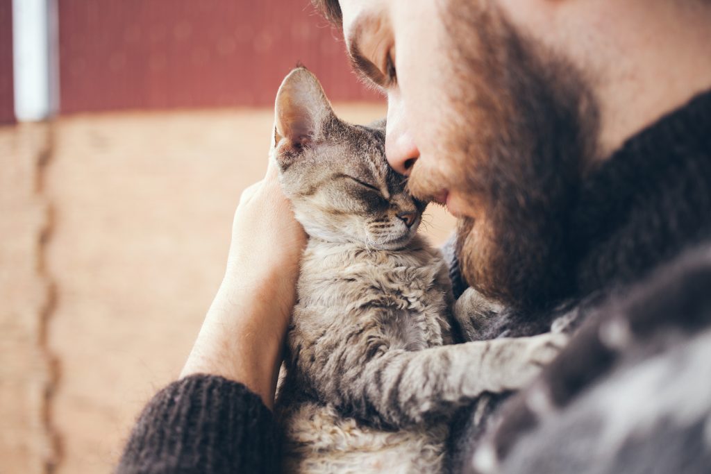 Man with pet cat